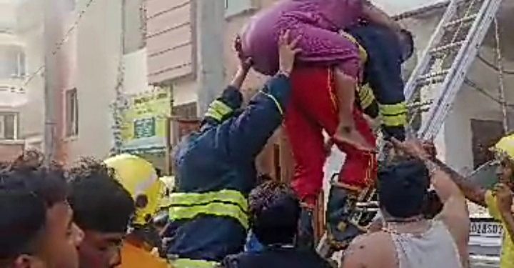 Fire service personnel rescue three people from building on fire in Bhubaneswar