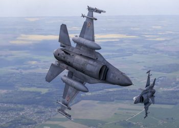 Portuguese Air Force F- 16 military fighter jets participating in NATO's Baltic Air Policing Mission operates in Lithuanian airspace, Monday, May 22, 2023. (AP Photo/Mindaugas Kulbis)