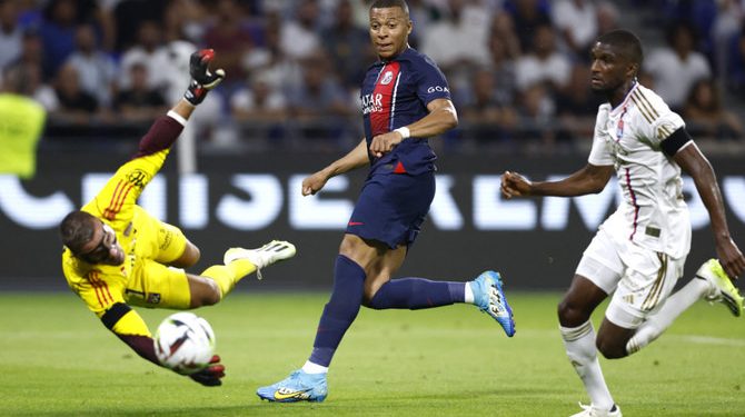 Soccer Football - Ligue 1 - Olympique Lyonnais v Paris St Germain - Groupama Stadium, Lyon, France - September 3, 2023
Paris St Germain's Kylian Mbappe scores their fourth goal REUTERS/Gonzalo Fuentes