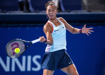 Zheng Qinwen of China hits a return against Paula Badosa of Spain during their women's singles match on day three of the Pan Pacific Open tennis tournament in Tokyo on September 21, 2022. (Photo by Philip FONG / AFP)