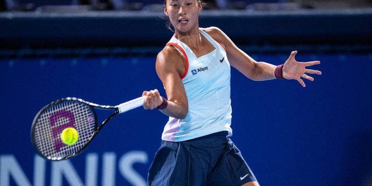 Zheng Qinwen of China hits a return against Paula Badosa of Spain during their women's singles match on day three of the Pan Pacific Open tennis tournament in Tokyo on September 21, 2022. (Photo by Philip FONG / AFP)