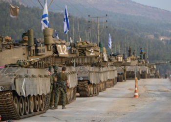 Israel moves hundreds of tanks close to Gaza fence as ground invasion looms