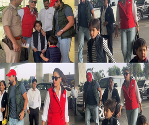 Saif, Kareena jet off for Christmas vacation; Taimur, Jehangir hold hands at airport