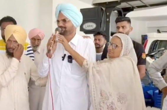 A view of Sidhu Moosewalas father Balkaur Singh and mother Charan Kaur addddressing Moosewalas fans at their house in Musa village on Sunday. Tribune photo: