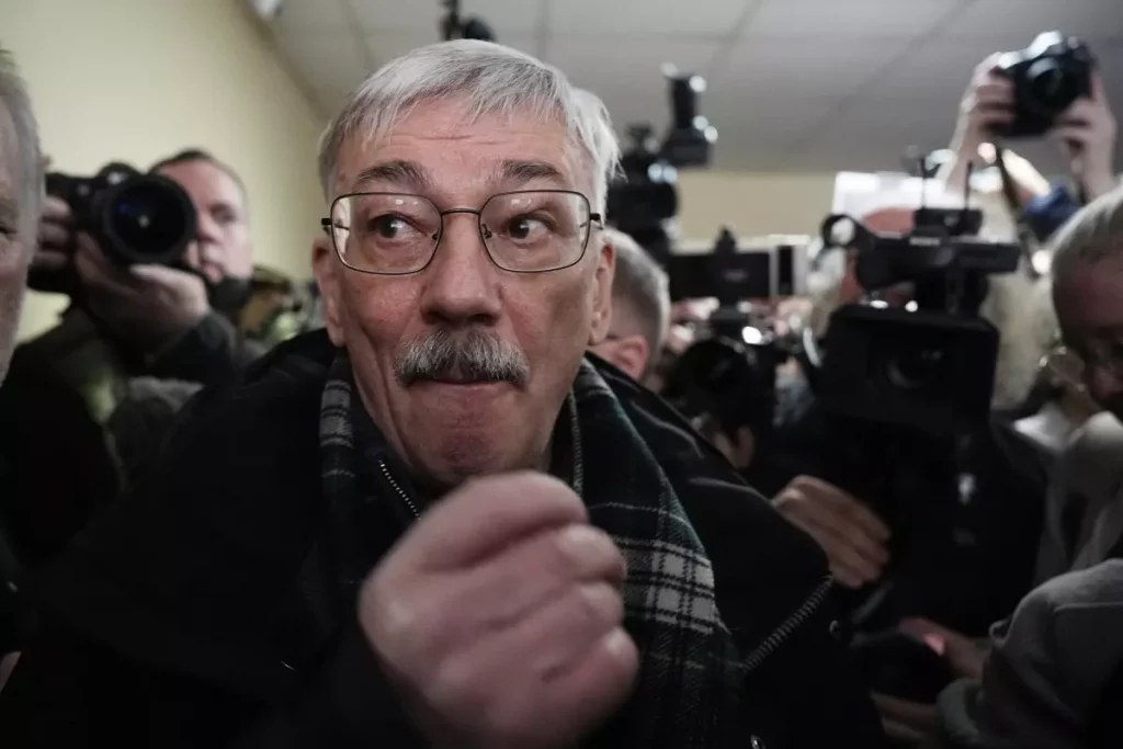 Russian court sentences co-chair of a Nobel-winning rights group to 30 months in prison