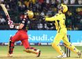 Bangalore: CSK captain MS Dhoni attempts a catch of RCB captain  Faf du Plessis during the IPL 2023 match between Royal Challengers Bangalore and Chennai Super Kings at M. Chinnaswamy Stadium, in Bangalore, on Monday, April 17, 2023. (Photo:IANS/Dhananjay Yadav)