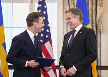 Secretary of State Antony Blinken, right, stands with Swedish Prime Minister Ulf Kristersson before presenting Sweden's NATO Instruments of Accession in the Benjamin Franklin Room at the State Department, Thursday, March 7, 2024, in Washington. (AP Photo/Jess Rapfogel)