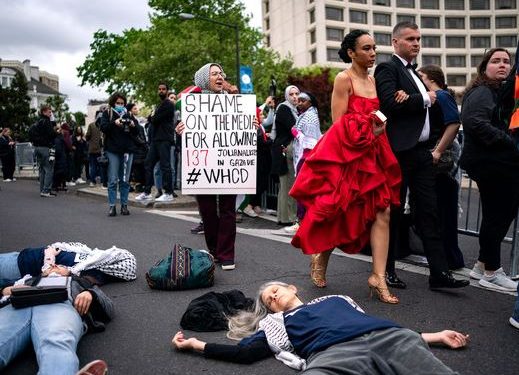 Chants of ‘shame on you' greet guests arriving for the annual White House correspondents' dinner