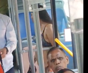 Viral video: Delhi woman boards jam-packed bus wearing bikini; internet demands police action!