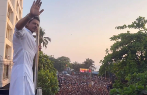 Shah Rukh Khan, son AbRam greet fans outside Mannat on Eid