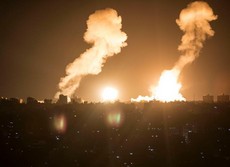 Fire and smoke are seen following an Israeli airstrike in the southern Gaza Strip city of Khan Younis on April 7, 2023. Israel on Friday intensified airstrikes on military posts in the Gaza Strip and Lebanon, in response to rockets fired from the areas at several parts in Israel, escalating tensions with Palestine over the past three days after Israeli police forcibly expelled Palestinian worshippers from the Al-Aqsa Mosque in East Jerusalem. (Photo by Yasser Qudih/Xinhua)