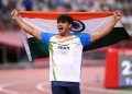 TOKYO, JAPAN - AUGUST 07: Neeraj Chopra of Team India celebrates winning the gold medal in the Men's Javelin Throw Final on day fifteen of the Tokyo 2020 Olympic Games at Olympic Stadium on August 07, 2021 in Tokyo, Japan. (Photo by Matthias Hangst/Getty Images)