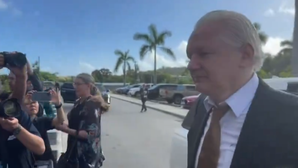 WikiLeaks founder Assange walks out of court as 'free man'