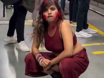 Girl dances on Delhi Metro