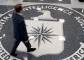 A group of 3,000 ordinary citizens, armed with nothing more than an Internet connection, is often making better forecasts of global events than CIA analysts. Here, a man crosses the CIA logo at its headquarters in Langley, Va.