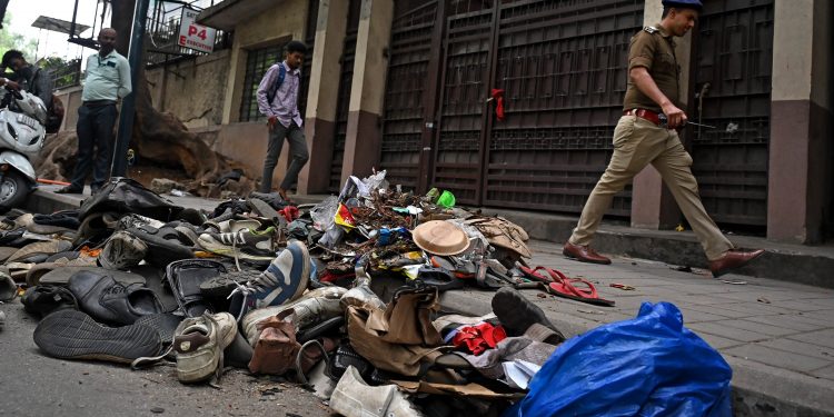 Remains littered the spot on Thursday where 11 people died in a tragic stampede, as thousands of fans had thronged to enter M Chinnaswamy Stadium in Bengaluru to take part in the celebrations of RCB's win in the Indian Premier League. DH PHOTO/PUSHKAR V @PUSHKAR V