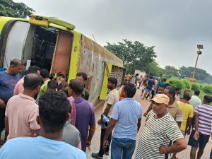Bus overturns