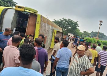 Bus overturns