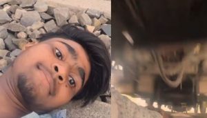 'Look at this idiot'_Viral video shows man risking life under moving train for likes
