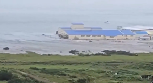 Tsunami hits Kuril Islands, Russian authorities evacuate residents