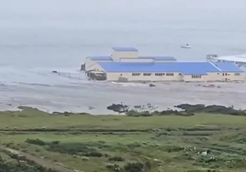 Tsunami hits Kuril Islands, Russian authorities evacuate residents
