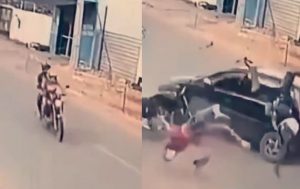 Viral video Instant karma as robbers go flying for free