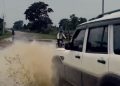 The viral video captures a post-rain moment and something that can only be described as instant karma. Watch.