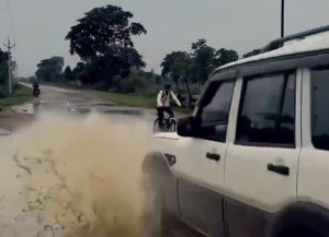 The viral video captures a post-rain moment and something that can only be described as instant karma. Watch.