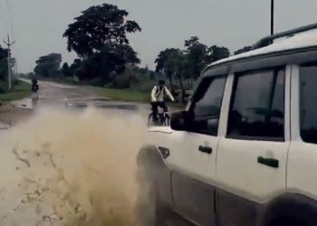 The viral video captures a post-rain moment and something that can only be described as instant karma. Watch.