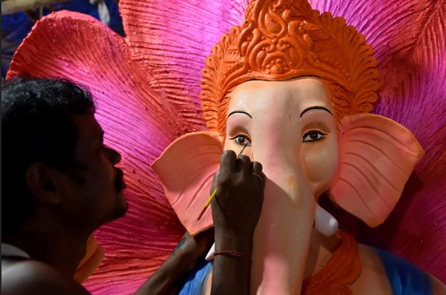 Artisans add the last brush of colour to Ganesh idols in Bhubaneswar