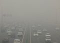 Traffic passes on a road as the sky is enveloped with smog after Delhi's air quality turned "severe" due to alarming air pollution, in New Delhi, India, November 18, 2024. REUTERS/Anushree Fadnavis     TPX IMAGES OF THE DAY