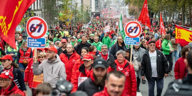 Belgian police fire tear gas as thousands protest austerity measures
