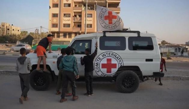 Israel returns 30 Palestinian bodies after militants hand over hostages