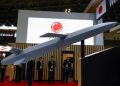 Japan lifts ban on lethal weapons exports, shifts defence policy