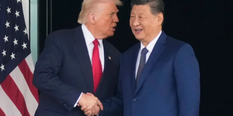 Trump arrives in China for talks with Xi