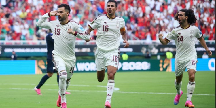 Spain beat Uruguay 1-0 to top group, eliminate two-time champions
