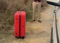 Unidentified woman’s body found stuffed in travel bag