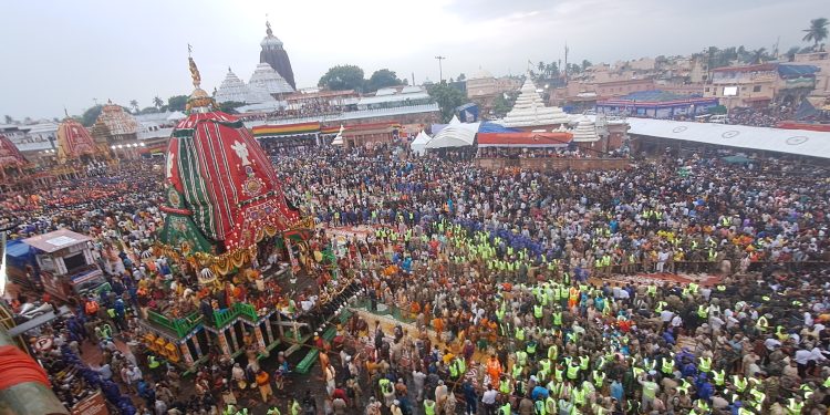 DIVINE JOURNEY: Lord Balabhadra’s Taladhwaja being pulled before Devi Subhadra’s Darpadalana and Lord Jagannath’s Nandighosha in Puri, Thursday. Pic credit: Yagneshwar Mohanty
