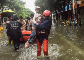Authorities in southern China said Thursday that 39 people have died in flooding from Tropical Storm Maysak. Most of the deaths were related to the breach of a dam in the city of Nanning, which claimed 26 lives, said Ding Wei, the city's vice mayor, at a news briefing. Maysak brought record rainfall to the Guangxi region, breaching reservoirs and stranding people for days in homes and other buildings. The previously announced death toll was six people.