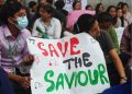 Behind the mask, doctors seek safety