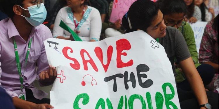 Behind the mask, doctors seek safety