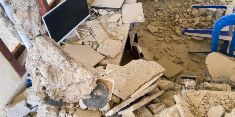 A monitor stands among debris at a building collapse following an earthquake of magnitude 7.7 in Golo Lewe village, West Manggarai, East Nusa Tenggara, Indonesia, August 15, 2026. REUTERS/Paula Venia
