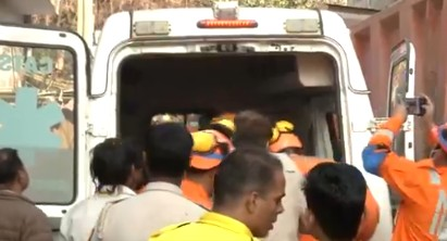 Father, son die after building slabs collapse
